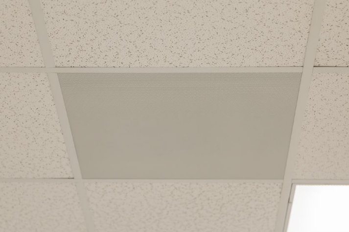 Ceiling tile microphone in classroom